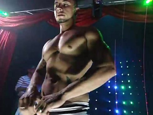 Hunky stripper shows dick